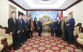 Thứ trưởng Ngoại giao Nguyễn Quốc Dũng chúc mừng Quốc khánh CHDCND Lào